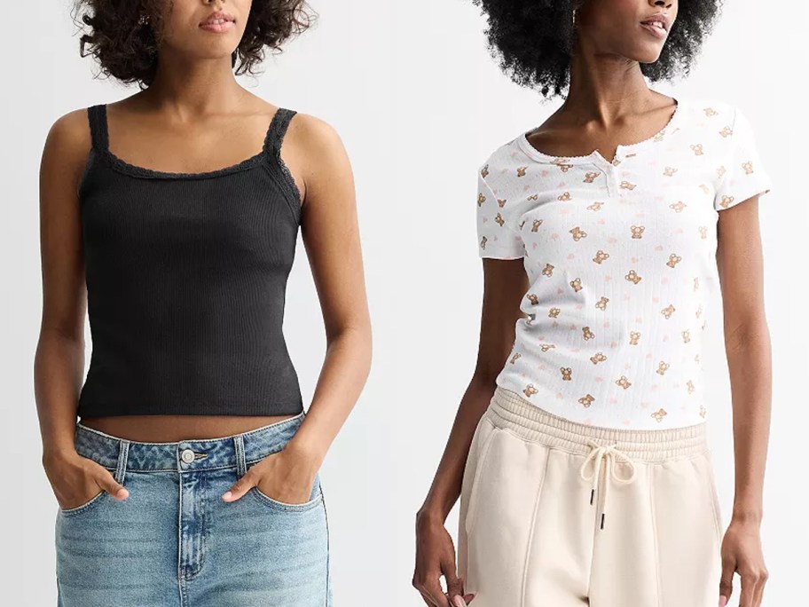 women wearing black and white tops 