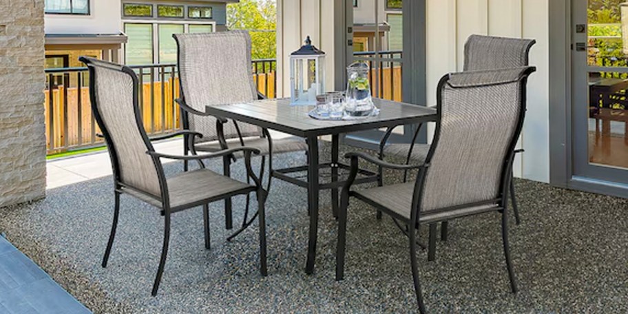tan and black patio set on porch