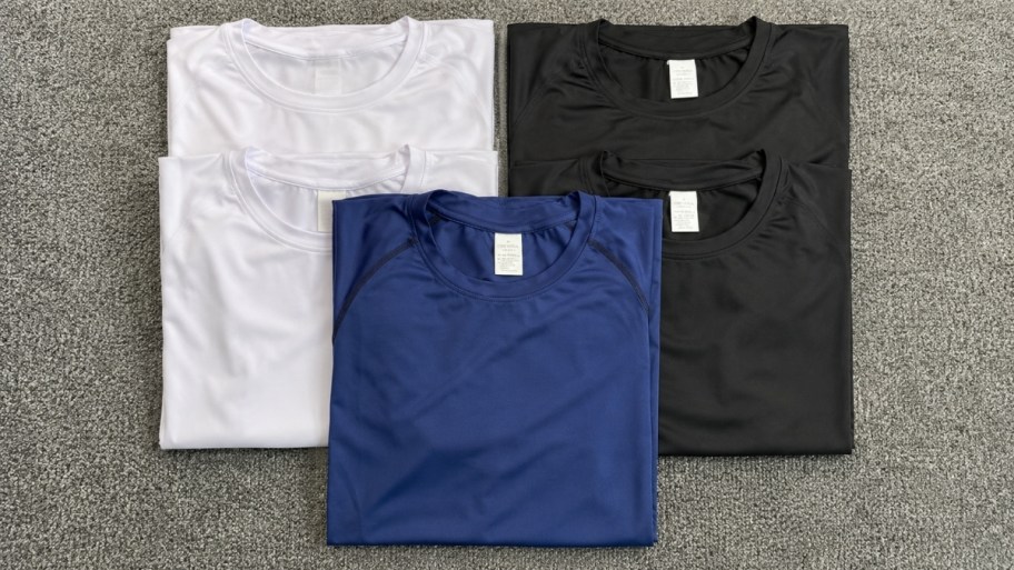 5 mens compression tees in assorted colors. 