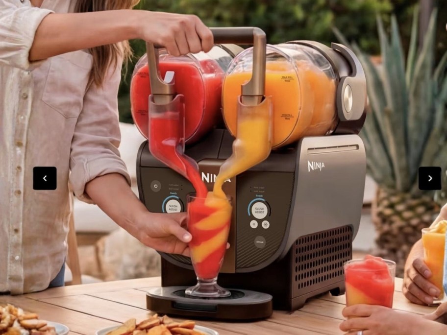 person making a slushi with a Ninja Slushi Twist machine