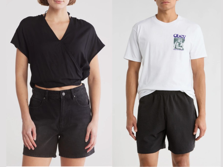 A person in a black V-neck top and high-waisted shorts stands beside another in a white graphic T-shirt and black shorts.