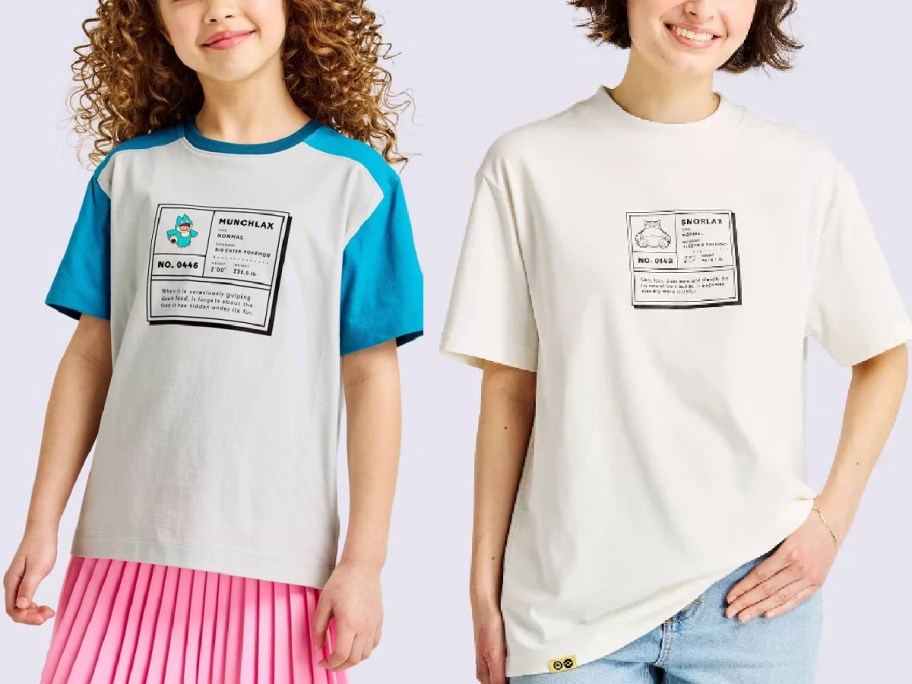 Two girls wearing graphic t-shirts. The t-shirt on the left has blue sleeves and features a Pokemon design while the shirt on the right is plain white with a minimalistic Pokemon design.