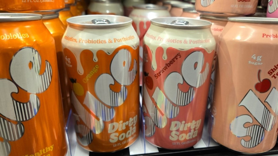 slice dirty soda cans on a store shelf