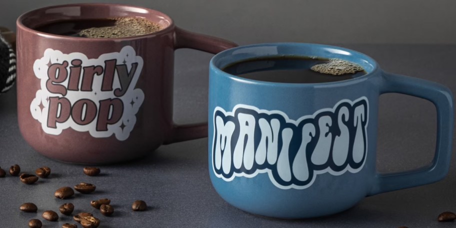 purple and blue mugs on counter