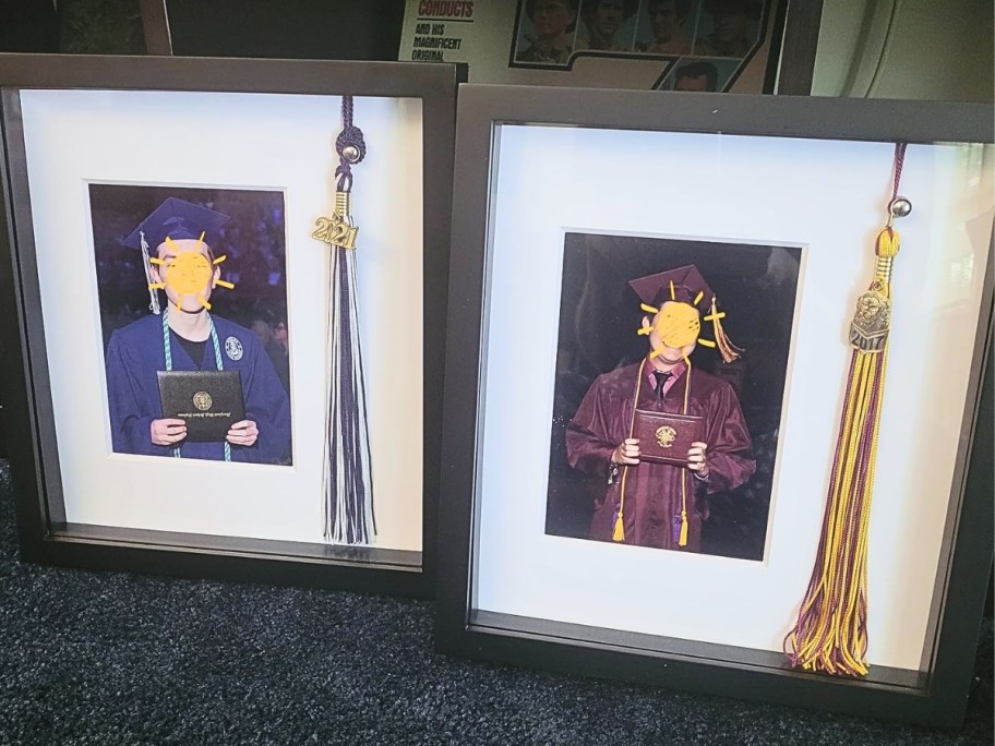 two grad tassel frames on display