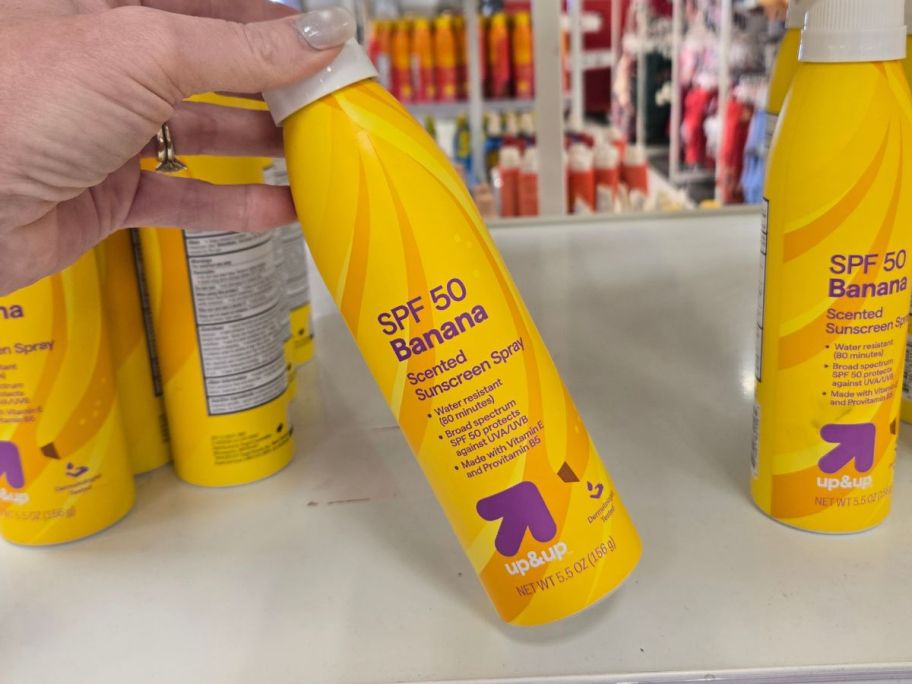 banana up&up SPF 50 Sunscreen Spray 5.5oz in hand in store