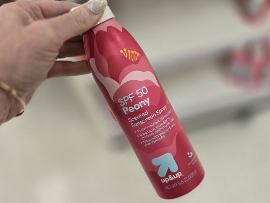 peony up&up SPF 50 Sunscreen Spray 5.5oz in hand in store