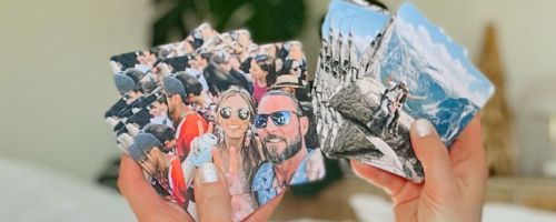 sara holding 2 sets of walgreens photo coasters