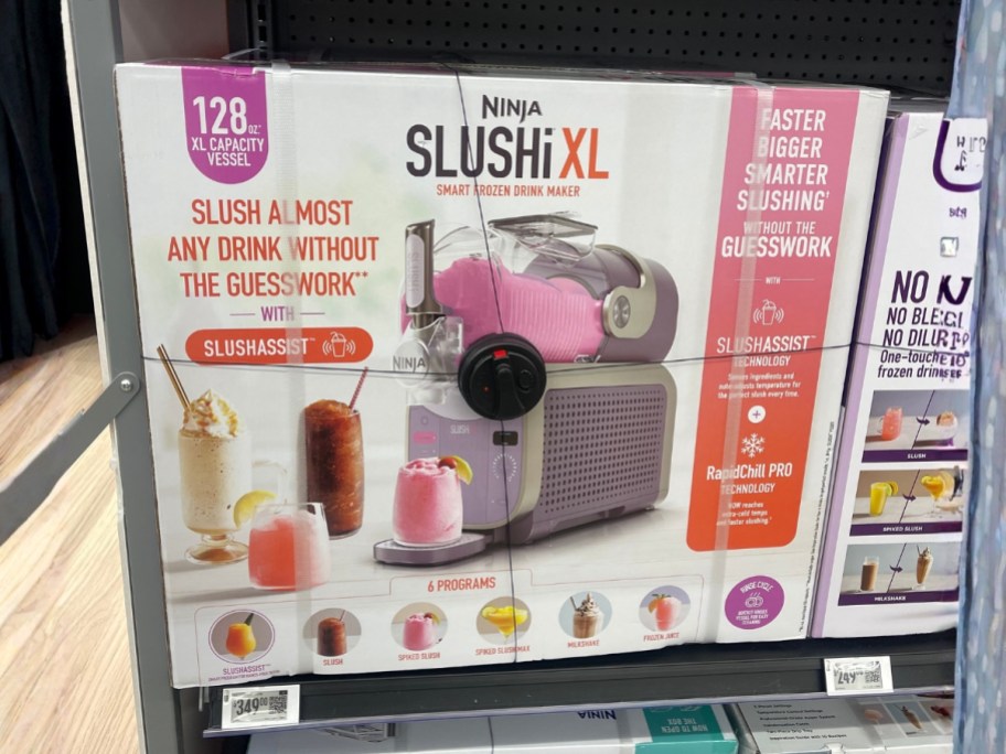 a Ninja Slushi box with a pink and purple color Slushi machine
