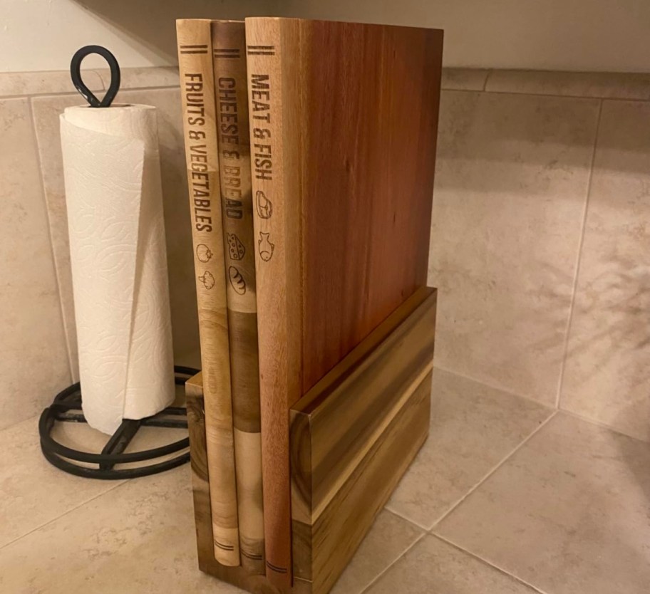 wooden cutting board set on kitchen counter