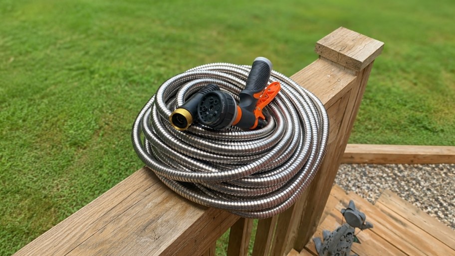 a 50 foot stainless steel water hose with nozzle