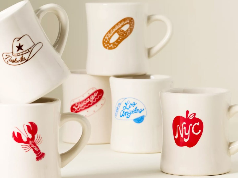 stack of food themed coffee mugs