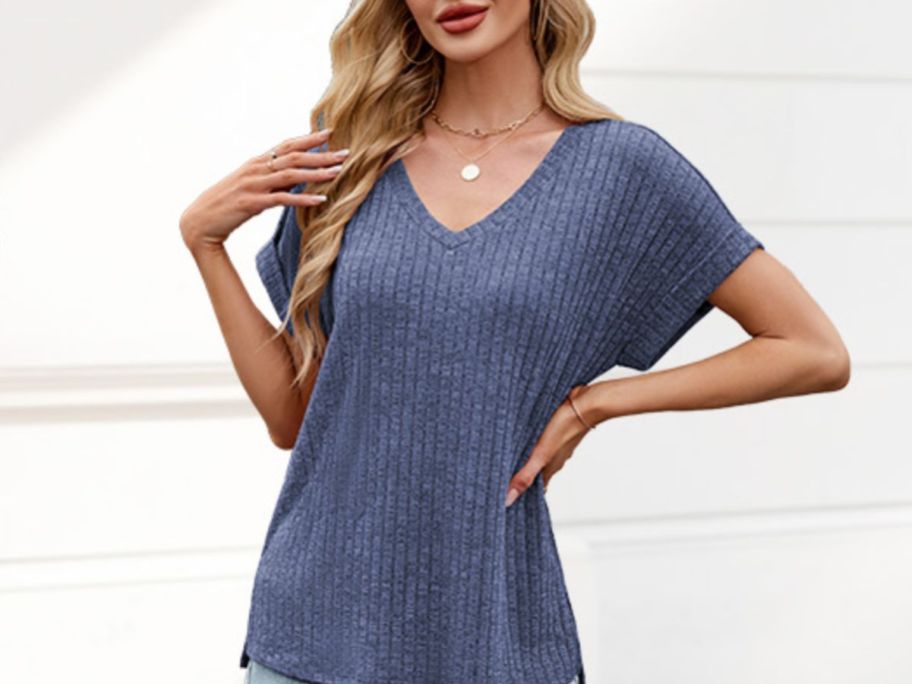 Woman wearing a blue fashion top from Amazon