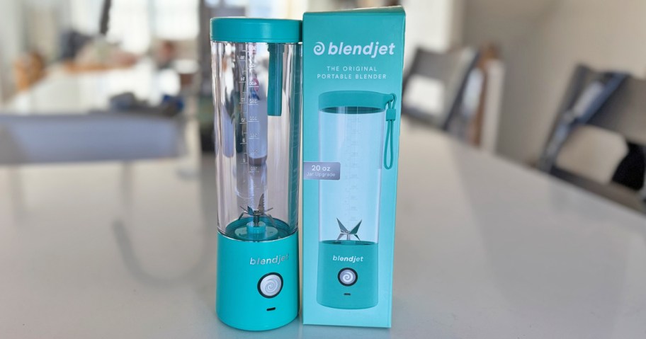 teal BlendJet Portable Blender and its box on a counter