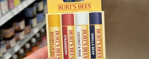 person holding pack of burt's bees lip balm in Best of Burt's Flavors in store