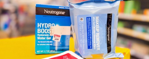 Neutrogena products with a $10 off cvs flyer in front of them