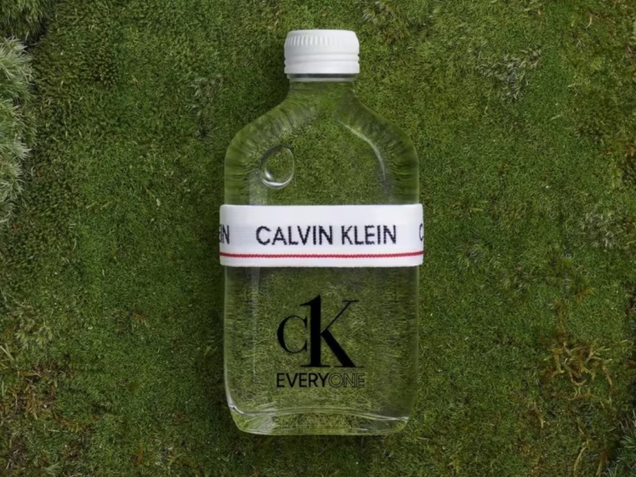bottle of Calvin Klein CK Everyone EDT on mossy grass