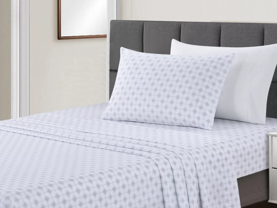 Macys sheets set on a bed