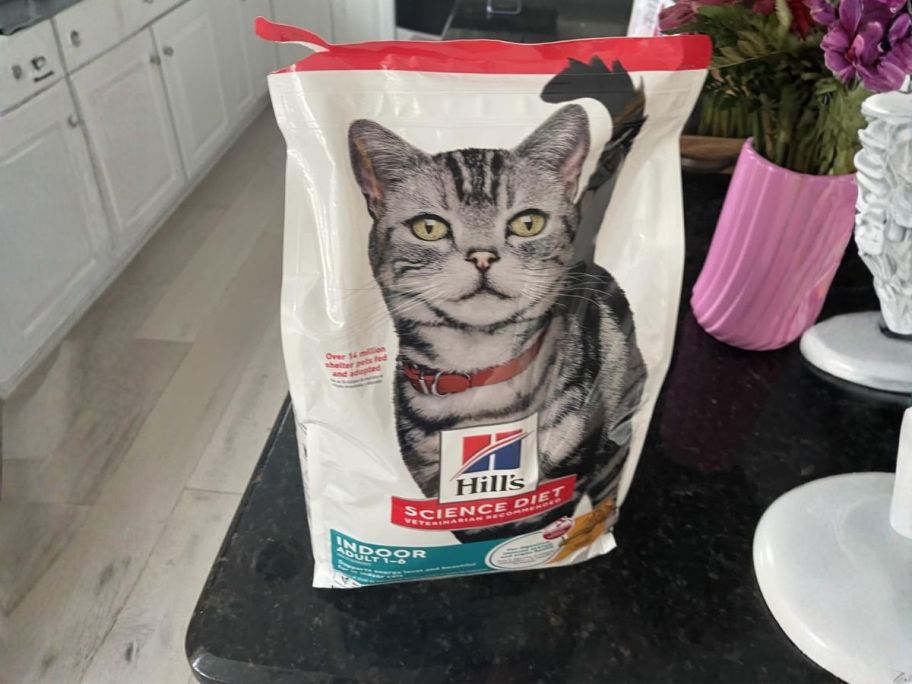 Hill's Science Diet Adult 1-6 Indoor Dry Cat Food 7lb Bag on table