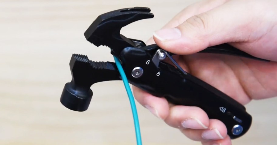 cutting a piece of wire using a multi-tool