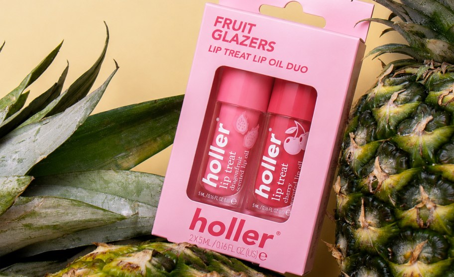 lip glaze gift set on top of pineapples