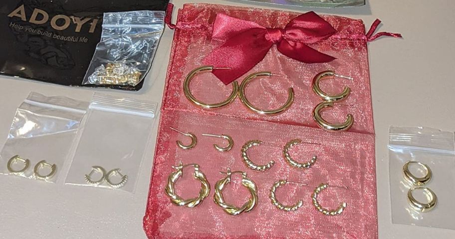 9 pairs of different style Gold Hoop earrings