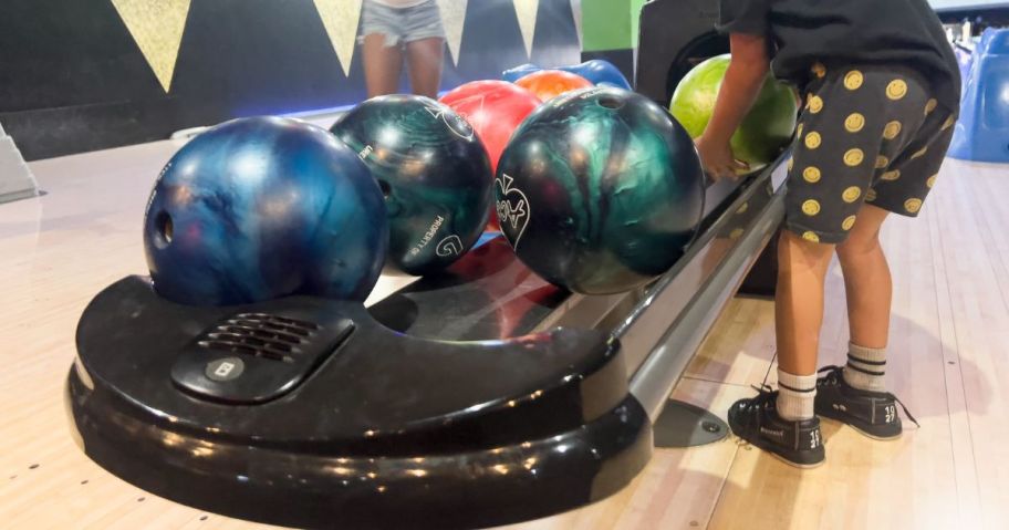 A ball machine at a bowling alley