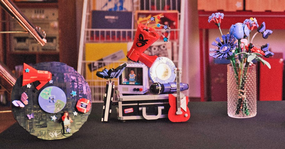 LEGO Olivia Rodrigo record, storage case, and flower sets on a table