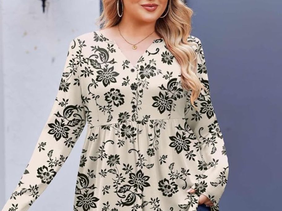 woman wearing patterned beige long sleeve top