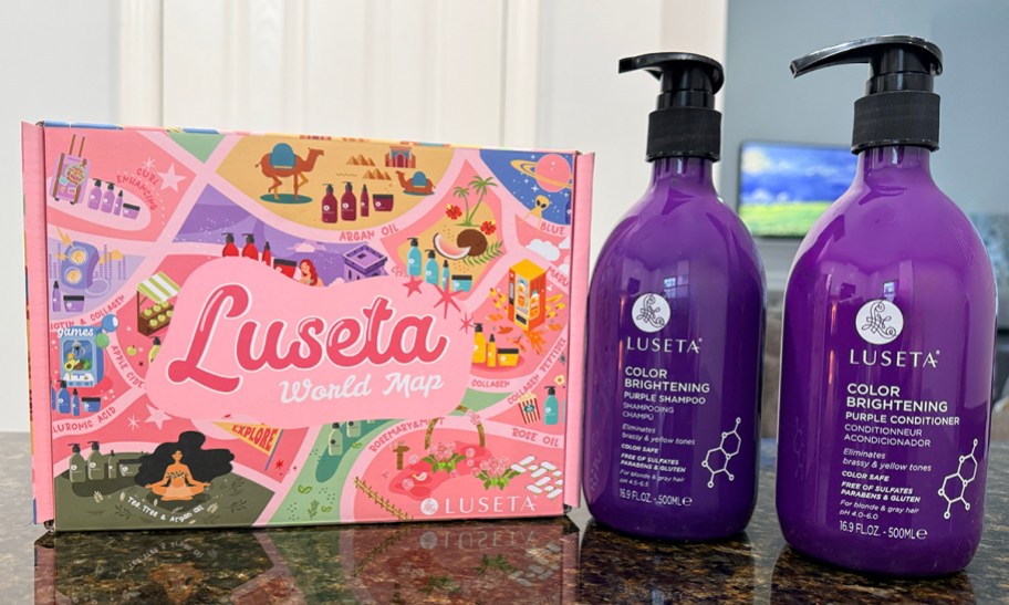 luseta purple shampoo and conditioner on a counter