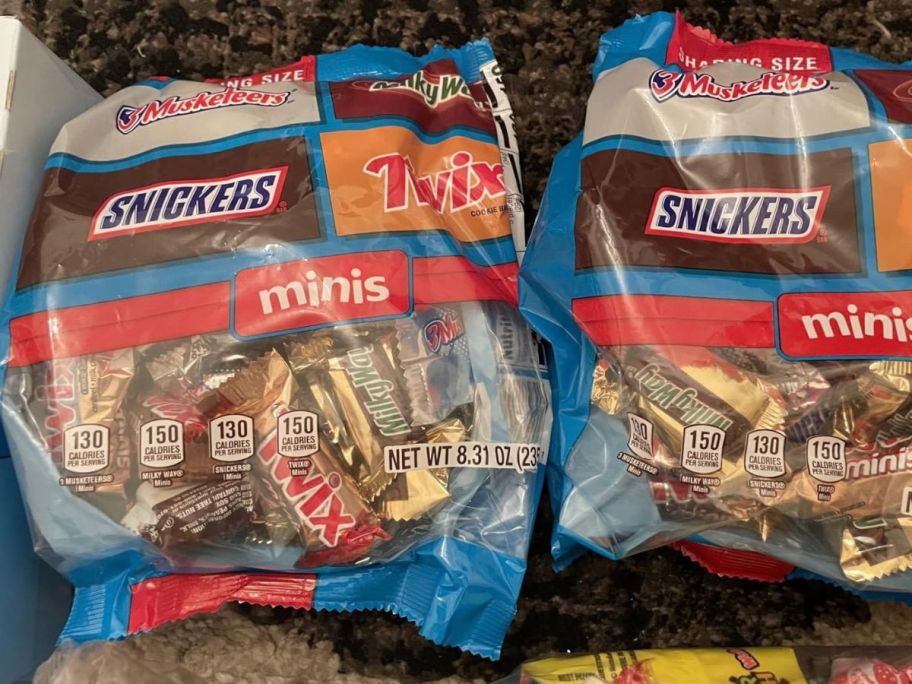 Mars Snickers, Twix, Milky Way, & 3 Musketeers Variety Pack 8.31oz bags on table