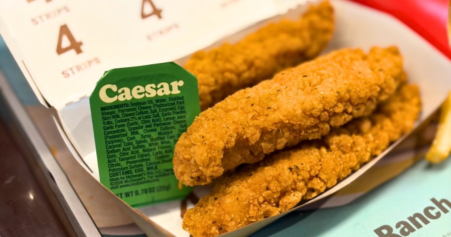 mcdonald's chicken tenders with caesar dressing cup in box at restaurant 