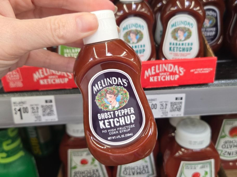 Melinda's Ghost Pepper Ketchup 4oz bottle in hand in store