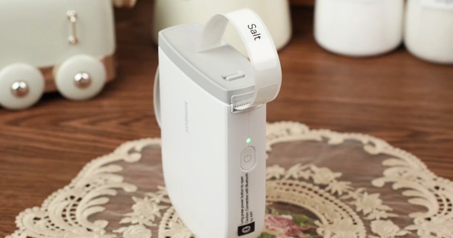 label printing from a white label maker on a table