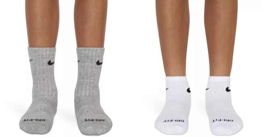 Stock images of two two kids wearing Nike socks