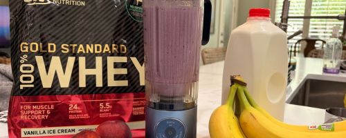 Ninja blender with whey protein, bananas, and milk