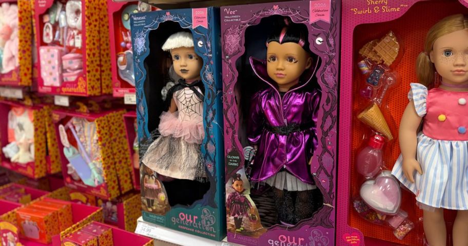 Our Generation Vee Halloween Collectible 18" spider and vampire dolls on shelf in store