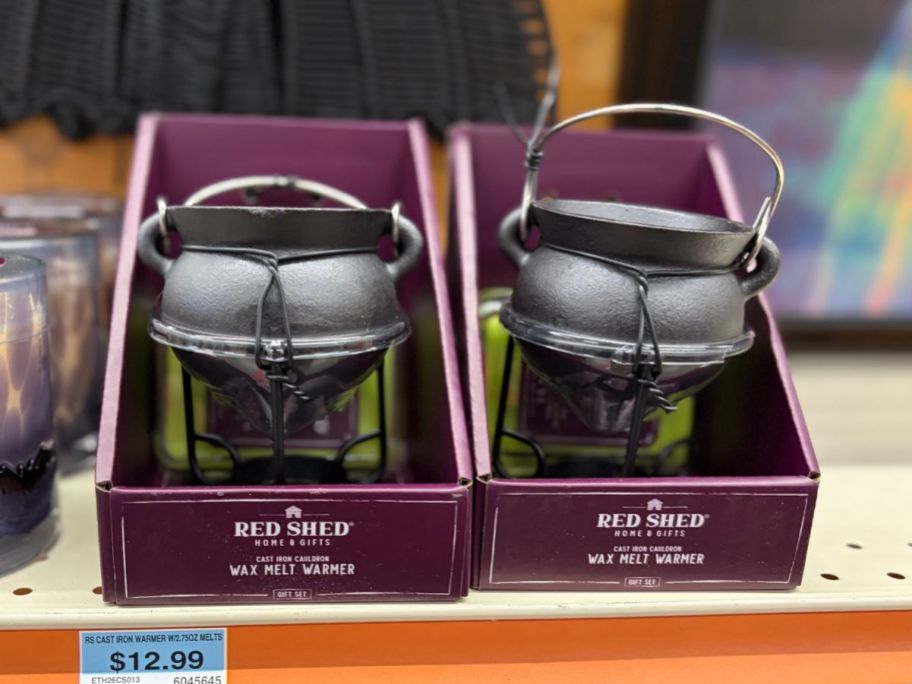 Red Shed Cast-Iron Cauldron Halloween Wax Warmers on shelf in store