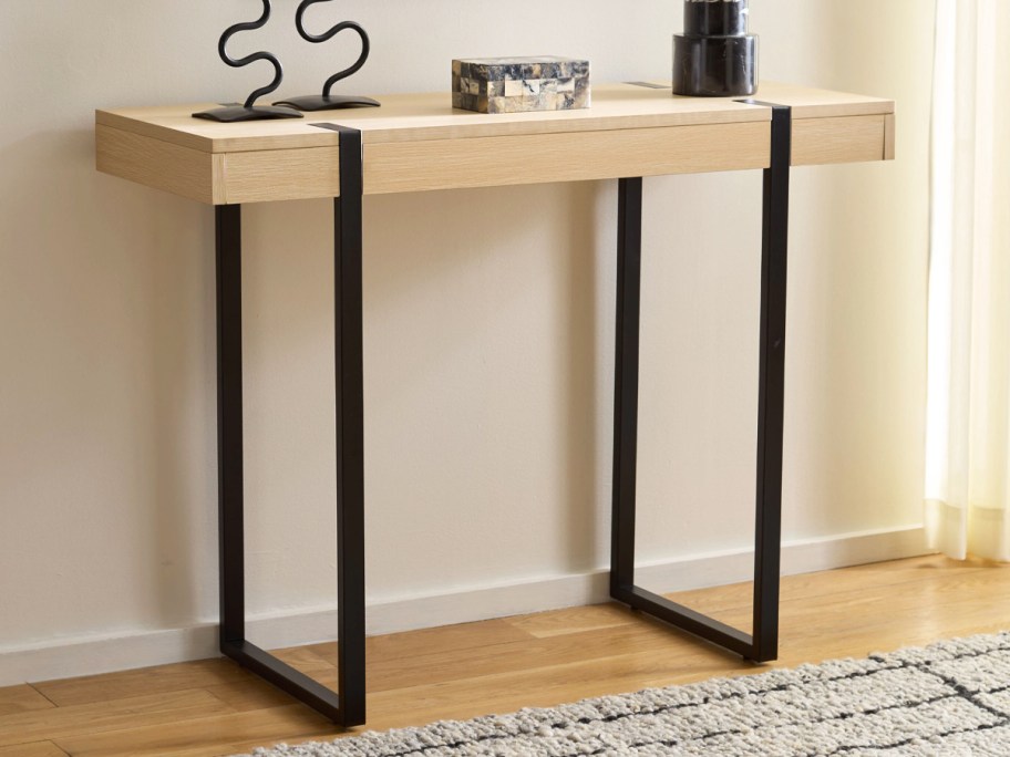 light wood and black metal coffee table
