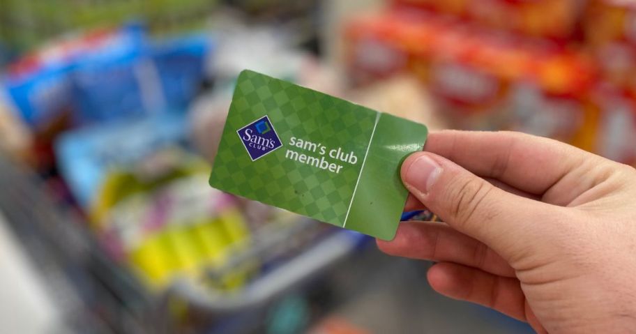 Hand holding a Sam's Club Membership Card