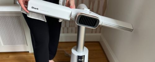 sara holding Shark TurboBlade Cool + Hot Tower Fan & Heater