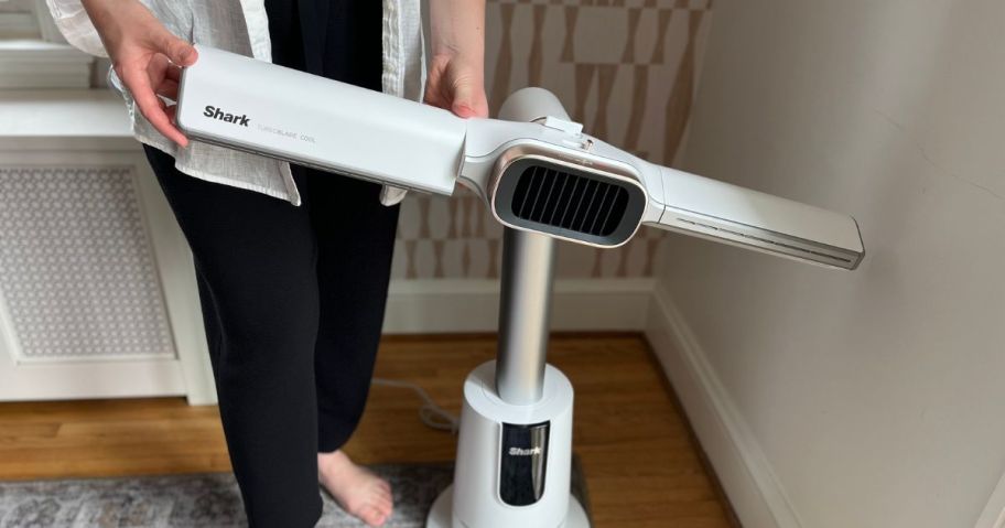 sara holding Shark TurboBlade Cool + Hot Tower Fan & Heater