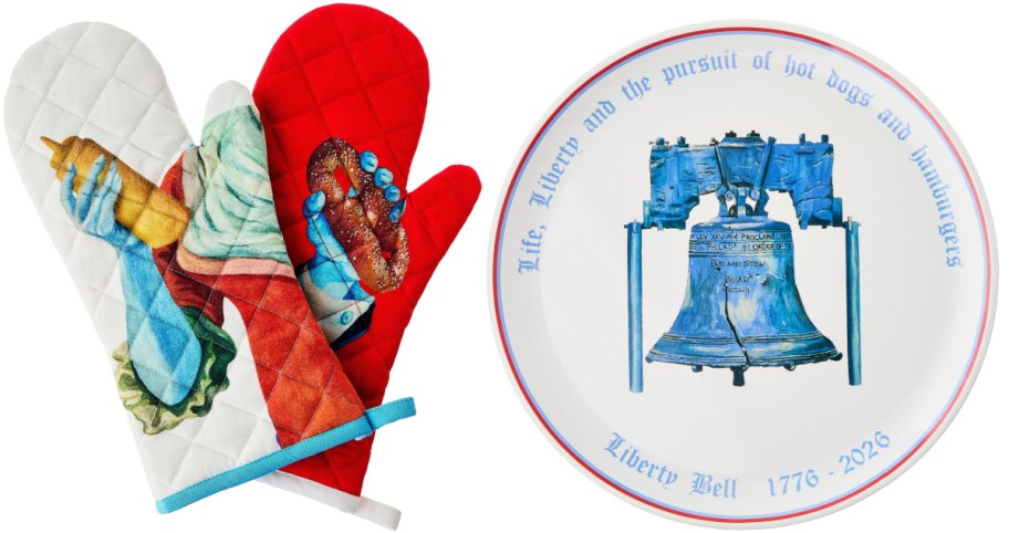 A pair of colorful oven mitts featuring illustrations of food items (a hot dog and a drink) alongside a decorative plate displaying the Liberty Bell with text that reads "Life, Liberty and the pursuit of hot dogs and hamburgers. Liberty Bell 1776-2026."