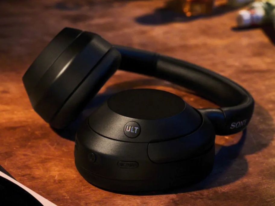 black Sony ULT WEAR Wireless Noise Canceling Headphones on desk
