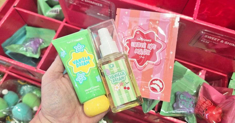 hand holding small beauty products in a store