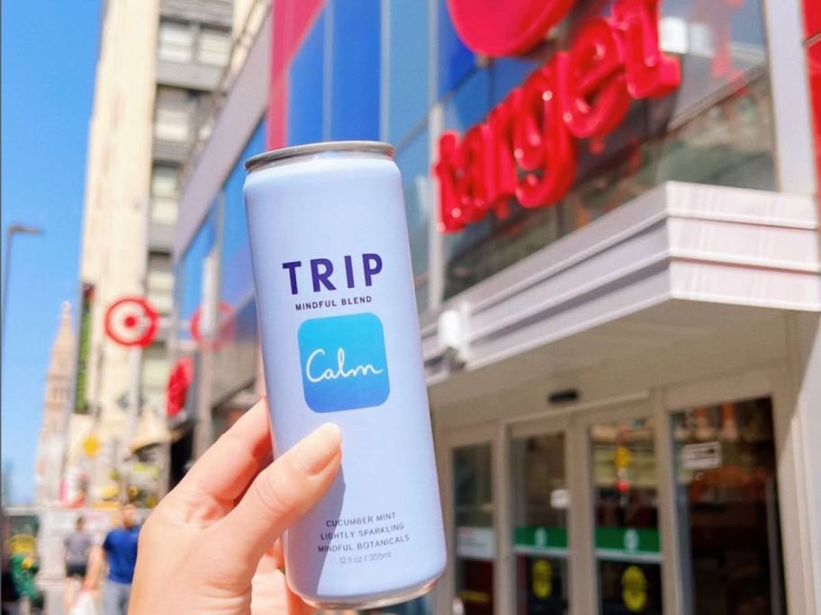 Hand holding up a Trip Mindful Blend Drink from Target
