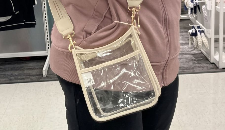 woman wearing Universal Thread Everyday Crossbody Bag in store