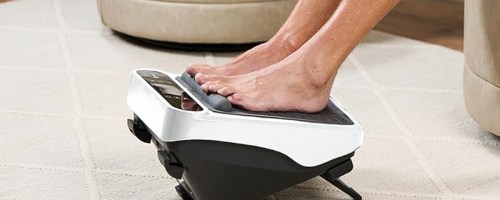 person with their feet on a foot massager