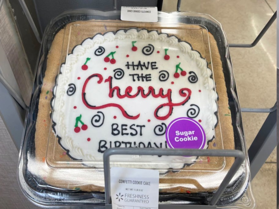 cookie cake that says "have the cherry best birthday"