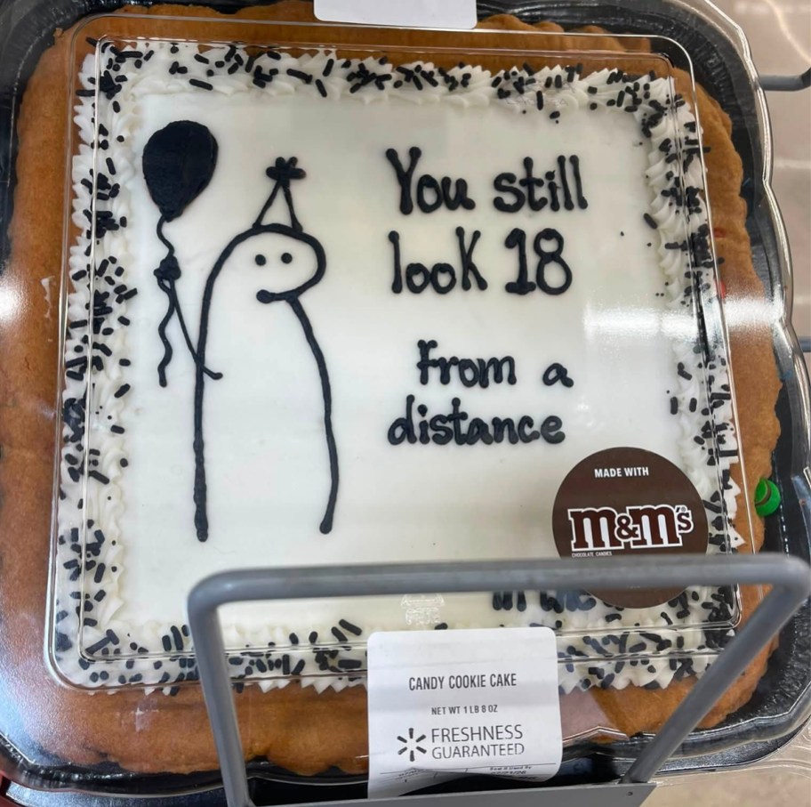 cookie cake that says "you still look 18 from a distance"
